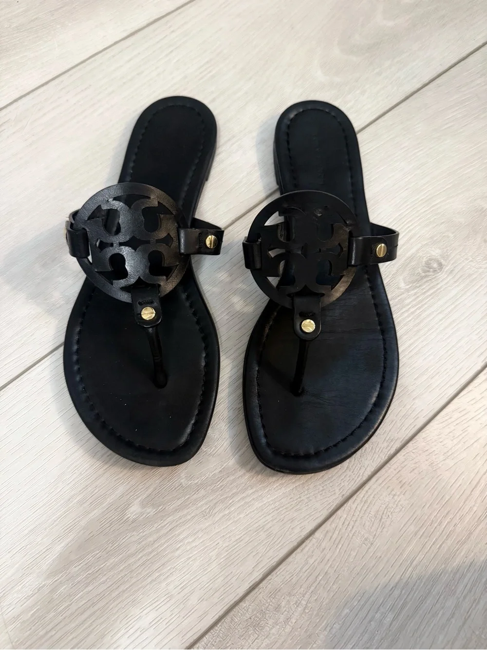 Tory Burch Black Leather Logo Thong Sandal with Gold Accents